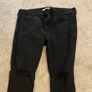 Men’s black skinny PacSun jeans with tips in knees. Great condition
